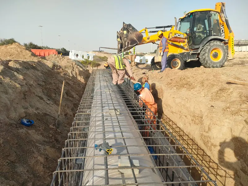 Existing utilities protection and future utility duct installation works during infrastructure pipeline construction by Osool AlRoyah General Contracting in the UAE