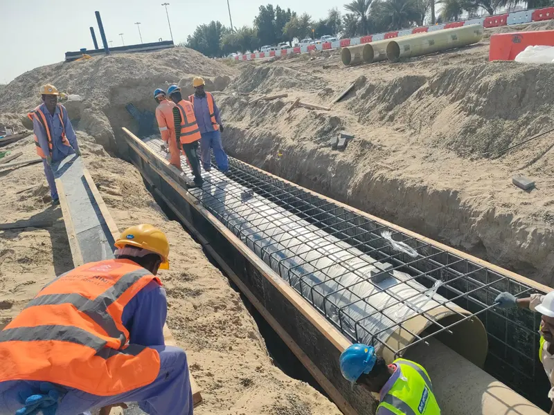 Stormwater drainage system construction with underground concrete pipeline installation by Osool AlRoyah General Contracting in the UAE